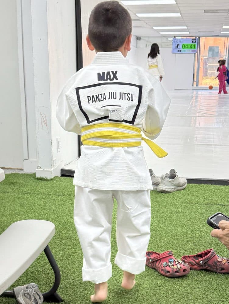 Young student in white gi with Panza Jiu-Jitsu patch in Torrance