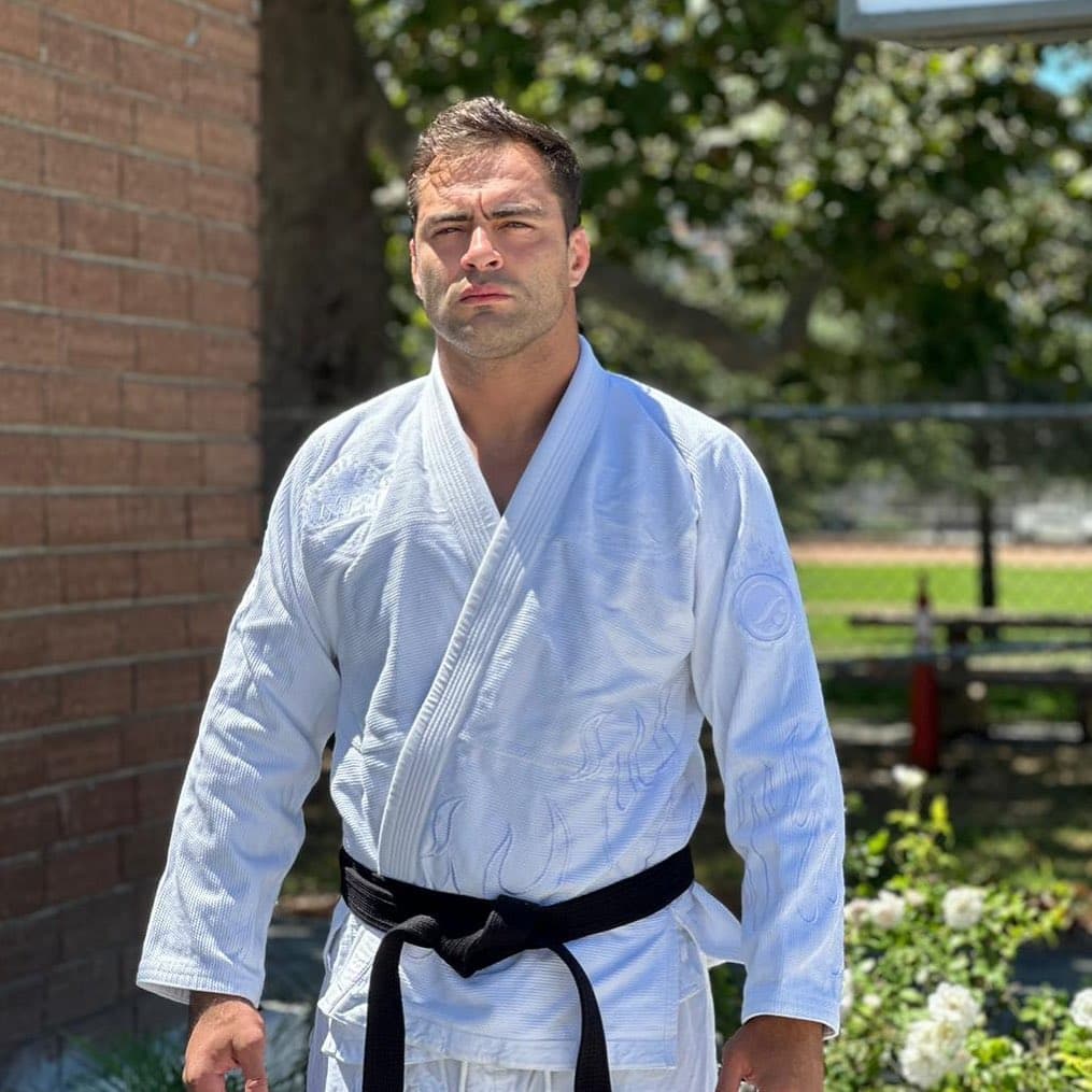 Professor Luiz Panza in white gi, head instructor at Panza Jiu-Jitsu in Torrance